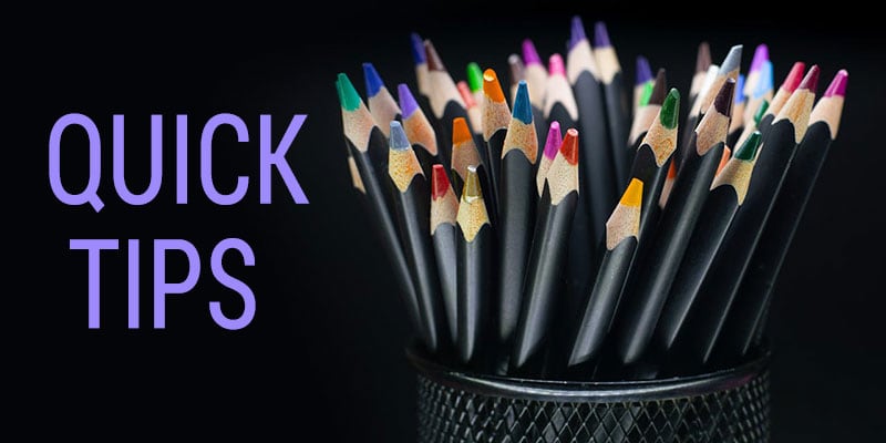 Colorful pencils in a black holder with "Quick Tips" text on a dark background, emphasizing creative ideas and advice for small businesses and digital solutions from Brandesigns Web Solutions.