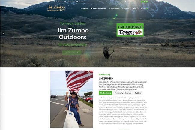 Jim Zumbo holding an American flag outdoors, with mountains in the background, representing outdoor activities and patriotism.